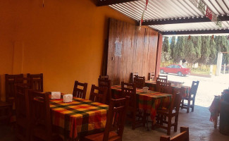 The Flaming Wings Dentro