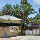 Giggling Dolphin Restaurant And Boat Bar outside