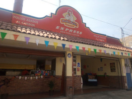 Pollos Asados Chela outside