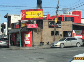 Tacos Al Carbon Santiago Garza outside