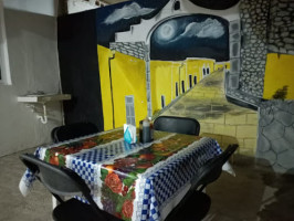 Pizzería Yarely inside