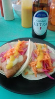 Los Capeados Tacos Chelas food