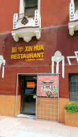 Xin Hua outside