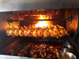 Poyoo: Pollos Rostizados A La Leña food