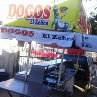 Dogos El Zebra outside