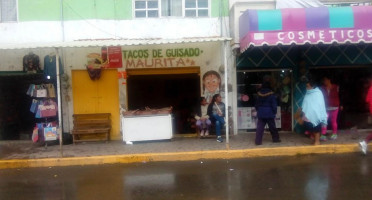 Tacos De Guisado outside