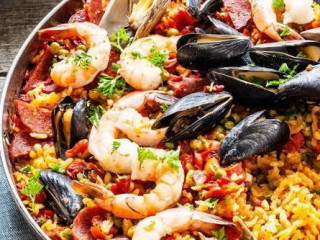 Paella Y Algo Más